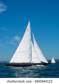 J Class Racing A Small Yacht In Calm Water