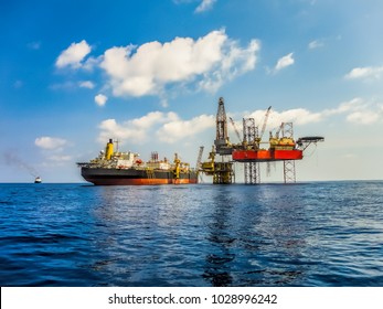 Jack Up Drilling Rig On Oil Production Platform And FPSO Ship