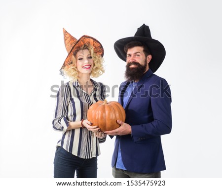 Jack o lantern. Preparation Halloween holidays. Happy couple dressed at Halloween party. Magic for Halloween. Celebration and party concept. 31 october. Halloween couple in witches hats with pumpkin.