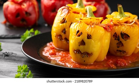 Jack o lanterns stuffed yellow pepper for Halloween. - Shutterstock ID 2189820789