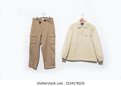 Jacket With Khaki Pants On Hanging  -white Background.

