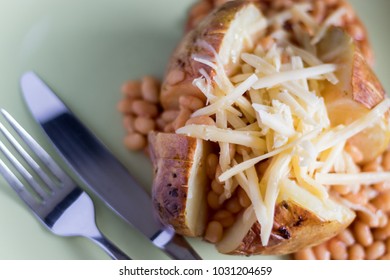 Jacket Potato With Baked Beans And Grated Cheese