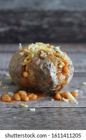 Jacket Potato With Baked Beans And Grated Cheese