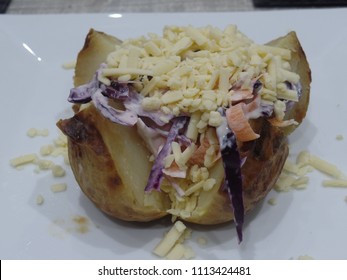 Jacket Potato Stuffed With Cheese And Coleslaw