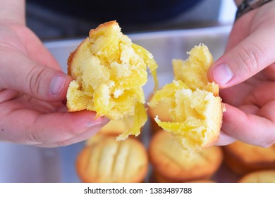 Jackfruit Cake Close-up In Hands On Many Blur Jackfruit Cakes Background