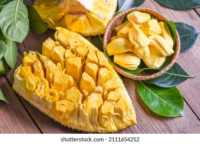 jackfruit on wooden basket with leaf, ripe jackfruit peeled tropical fruit fresh from jackfruit tree