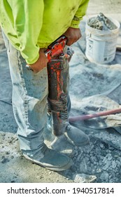 A Jackhammer In Use At A Constuction Site