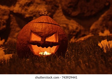 jack-o-lantern glowing in the night