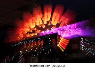 Jackpot winner sign from casino gambling and amusement arcade with zoom bur - Shutterstock ID 211720165