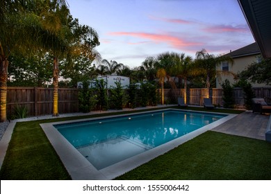 Jacksonville Beach, Florida / USA - November 9 2019: Backyard Of A Pool Home At Night