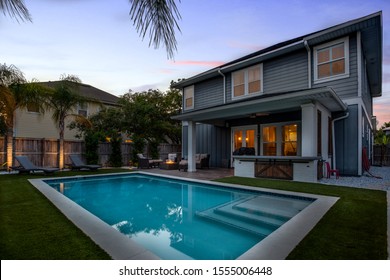 Jacksonville Beach, Florida / USA - November 9 2019: Backyard Of A Pool Home At Night