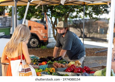 Jacksonville, Florida United States -  Saturday May 1, 2021: Riverside Art Market Event Hosted Many Local Artists, Farms And Businesses. Families And Young People Gather Under The Fuller Warren Bridge