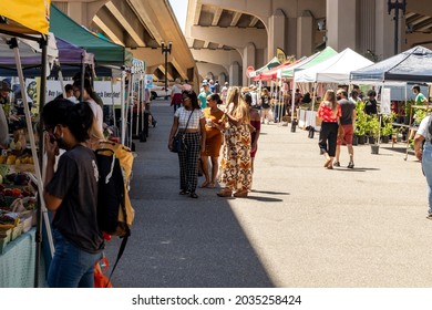 Jacksonville, Florida United States -  Saturday May 1, 2021: Riverside Art Market Event Hosted Many Local Artists, Farms And Businesses. Families And Young People Gather Under The Fuller Warren Bridge