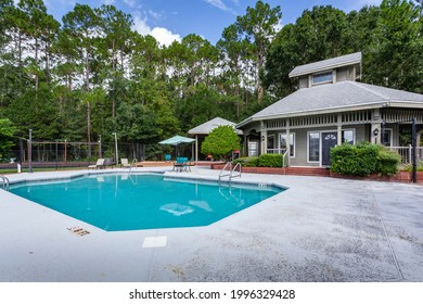 Jacksonville, Florida USA - June 24, 2021: Community Pool With Clubhouse