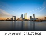 Jacksonville, Florida, USA skyline on the river at twilight.
