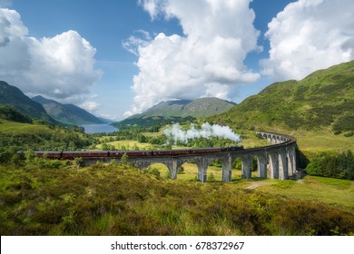 The Jacobite Steam Train Passes Glenfinnan Viaduct.