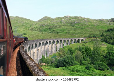 The Jacobite Train Crossing The Glenfinnan Viaduct.