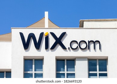 Jaffa, Israel - September 30, 2020: Wix logo on a company building with blue sky in the background, central Tel Aviv.