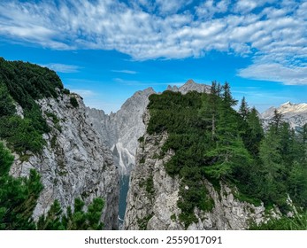 Jagged rock formation with scenic view of rugged mountain peak Prisank in majestic Julian Alps seen from Triglav National Park, Vrsic pass, Slovenia. Wanderlust wild Slovenian Alps. Sharp steep ridges - Powered by Shutterstock