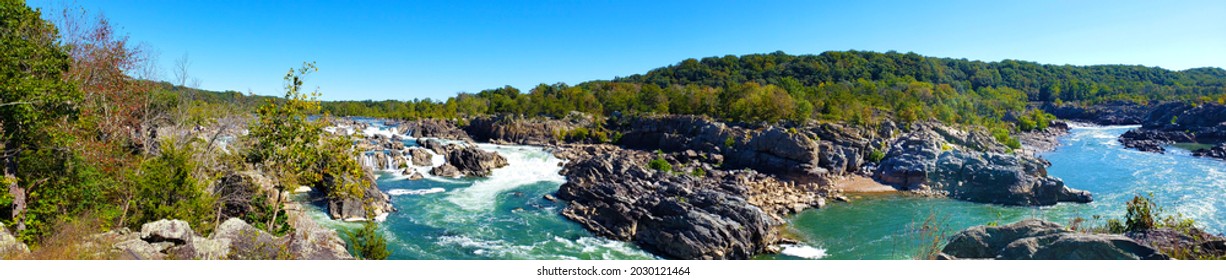 Jagged Rocks And The Dangerous White Waters Of The Potomac River At The Great Falls Park In, Virginia. Panoramic View