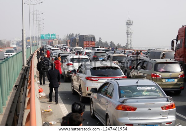JAINGXI CHINA-February 12, 2018: China Spring
Festival Transport, foggy weather led to high-speed closure, Hubei
Jiangxi junction high-speed, causing serious traffic congestion for
several kilometers.