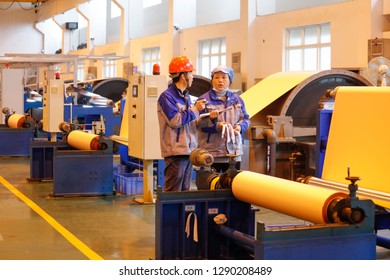 JAINGXI CHINA:January 19, 2019: Workers On A Copper Foil Production Line For Electronic Lithium Batteries In Jiangxi Province. For The First Time, China's GDP Surpassed 90 Trillion Yuan, Up 6.6%.