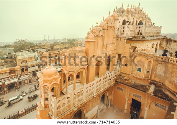 JAIPUR, INDIA - FEB 6: Aerial view on the\
street from roof of Hawa Mahal -Palace of Winds- built in 1799 on\
February 6, 2015. Jaipur, with population 6,664,000 people, is a\
capital of Rajasthan