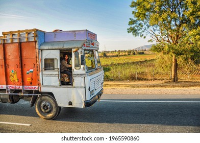 Jaipur, India - Jan 04, 2020: Happy Asian Indian Lorry Driver Sitting In His Truck And Smiling Happily At Jaipur, India