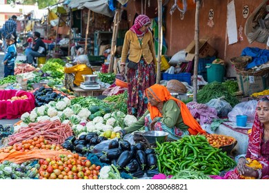 Jaipur, India - Nov 25, 2018 : Food Trader Selling Vegetables In The Street Market In Holy City Jaipur, Rajasthan, India