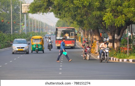 Jaipur, India - November 16, 2017: People Crossing A Busy Road..