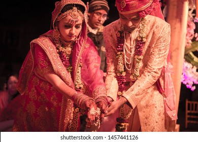 Jaipur, rajasthan, india - february 11th, 2019: North indian hindu wedding bride and groom at mandap.