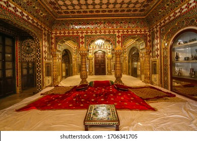 Jaipur, Rajasthan, India, January 6,2020: Royal room interior view at historic City Palace Jaipur decorated with precious gems and gold artwork at Rajasthan India