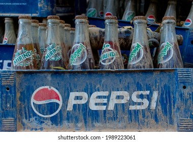 Jaisalmer, India - CIRCA 2021: Crates Of Cold Drinks Placed Outside Under A Tree