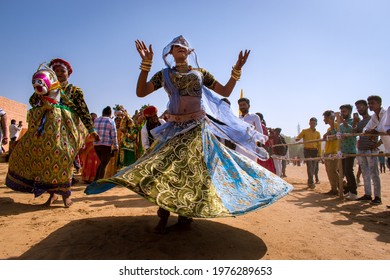 Jaisalmer, Rajasthan, India - 02 27 2021: Local Woman Dancer Dances On In The Desert Festival