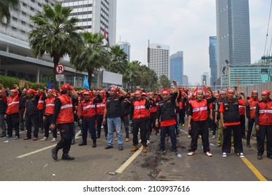 Jakara, Indonesia – May, 1, 2015 – Thousands of people from labor unions express their aspirations during the commemoration of labor day in Jakarta, Indonesia on 5 May 2015.