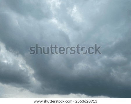 jakarta dec 24 Dramatic gray clouds forming an overcast atmosphere, creating a moody and mysterious sky scene.