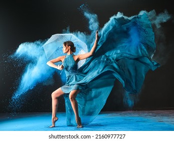 "Jakarta, DKI - Indonesia - March 07,2022 : Young woman dancing accompanied by powder