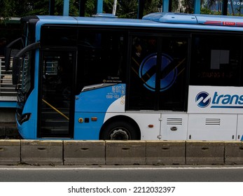 Jakarta , Indonesia -09 October 2022: Indonesia Transjakarta Bus (Public Transportation Busway) On Sudirman Street