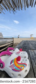 Jakarta, Indonesia - 10 June 2022 : Crocs For Kids With The Beach Background