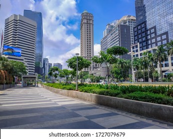 Jakarta, Indonesia 10 March 2020: Sidewalk At Jakarta City Along Jendral Sudirman Street In The Morning Is Quiet With Modern Building In The Background