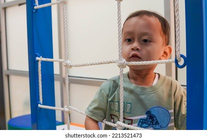 Jakarta, Indonesia 12th 2022 : Child Occupational Therapy Session. Male Children Doing Playful Exercises With His Therapist.