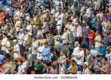 JAKARTA INDONESIA 2016: Men Praying Inside Istiqlal Mosque In Jakarta During The Month Of Ramadan, Indonesia