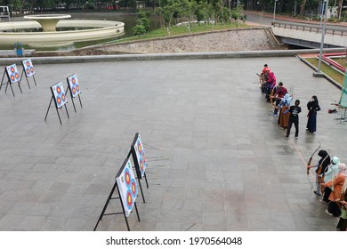 Jakarta, Indonesia 5 May 2021: Muslim Youth Community Playing Archery In The Courtyard Of The Istiqlal Mosque