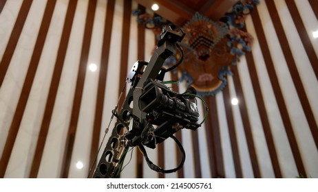 Jakarta, Indonesia - April 09, 2022: A Sony Television Camera On A Crane Outside The Studio. The Video Camera Hanging On The Crane Prepares For A Live Sporting Event. Camera For Live Broadcast 