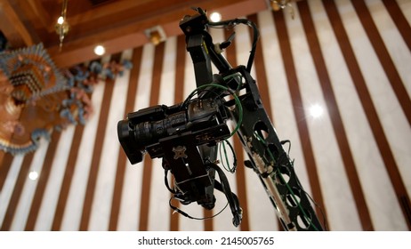 Jakarta, Indonesia - April 09, 2022: A Sony Television Camera On A Crane Outside The Studio. The Video Camera Hanging On The Crane Prepares For A Live Sporting Event. Camera For Live Broadcast 