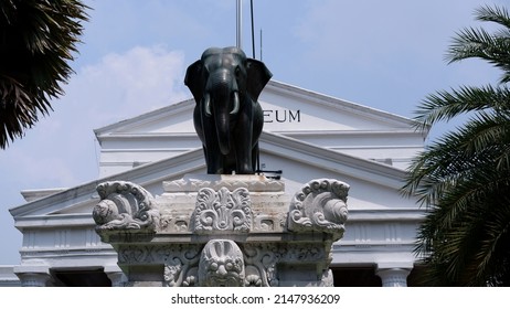 Jakarta, Indonesia - April 20, 2022: Elephant statue in front of the Indonesian National Museum building.  The elephant statue was a gift from the King of Siam (now Thailand), Chulalongkorn or Rama V.