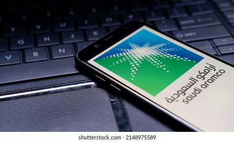 Jakarta, Indonesia - April 24, 2022: Saudi Aramco Logo In Smartphone With Keyboard Background. Saudi Aramco Is Biggest Oil Company From Saudi Arabia 