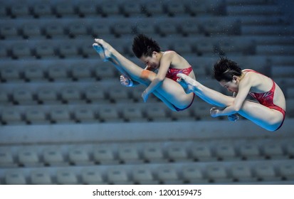 JAKARTA, INDONESIA - AUGUST 18, 2018 : China Diving Athlete Compete In Women's Synchronised 10m Platform Diving Final On The 2018 Asian Games In Jakarta.