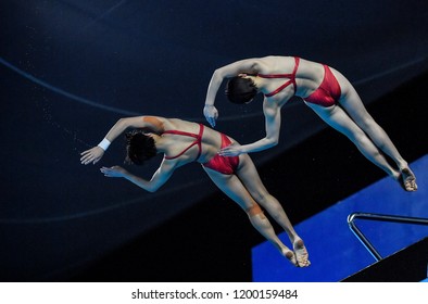 JAKARTA, INDONESIA - AUGUST 18, 2018 : China Diving Athlete Compete In Women's Synchronised 10m Platform Diving Final On The 2018 Asian Games In Jakarta.