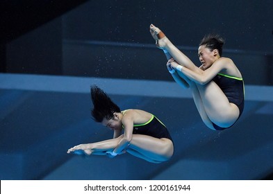 JAKARTA, INDONESIA - AUGUST 18, 2018 : Singapore Diving Athlete Compete In Women's Synchronised 10m Platform Diving Final On The 2018 Asian Games In Jakarta.